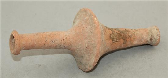 A Greek Hellenisitic terracotta spindle flask, 3rd century B.C., 20.5cm